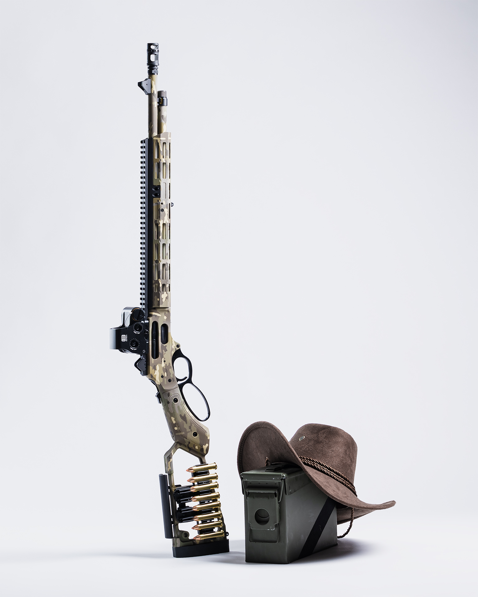 Modern lever action rifle with custom modifications and optics"